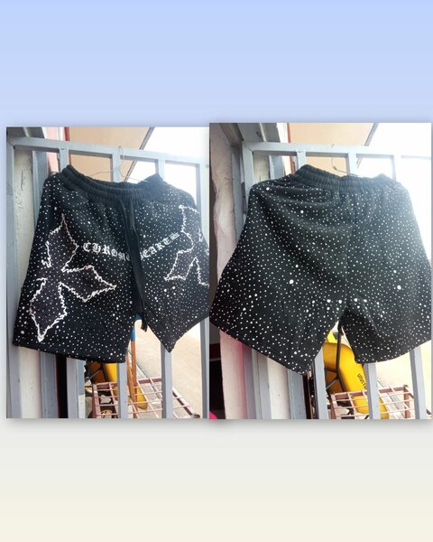 Shorts noirs à pois blancs tendance