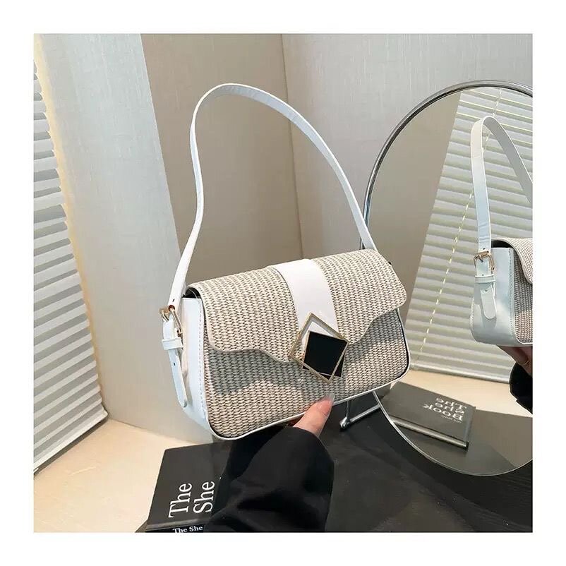 Sac à main élégant tissé