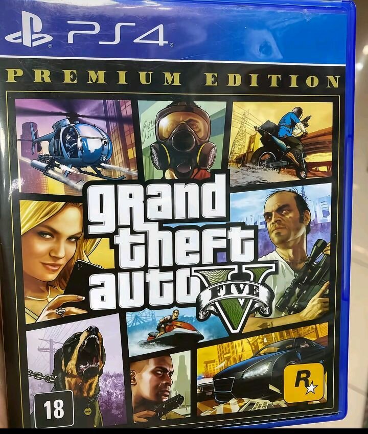 Console Sony PS4 avec manette et GTA V