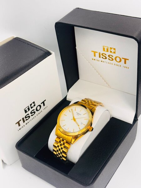 Montre Tissot couleur or