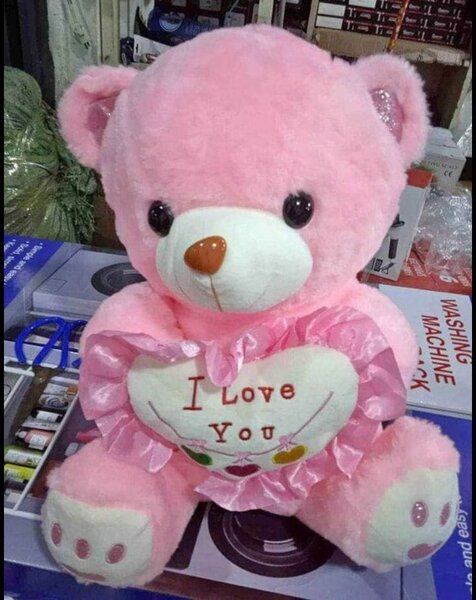 Ours en peluche rose avec coeur