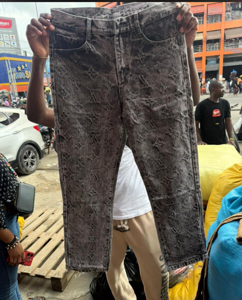 Jeans effet usé homme