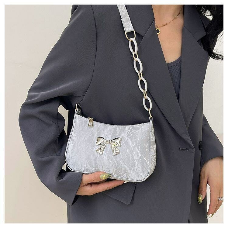 Sac bandoulière élégant avec nœud