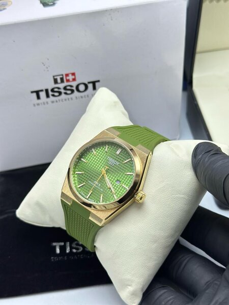 Montre Tissot verte en or rose