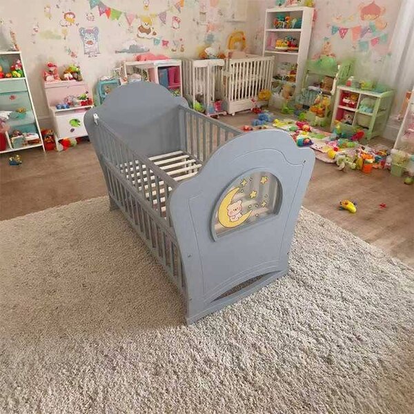 Lit bébé gris avec rangement