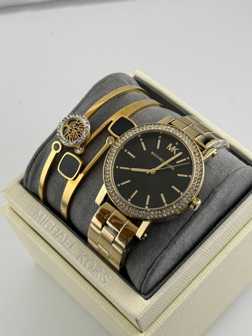 Montre Michael Kors en or avec bracelets
