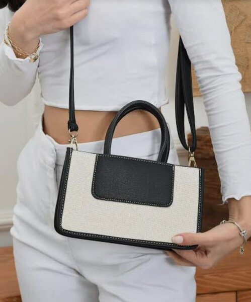 Sac à main en toile et cuir noir