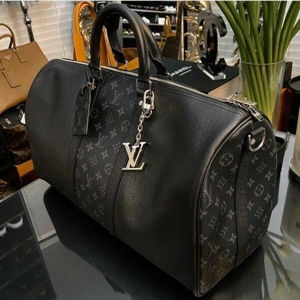 Sac de voyage luxe Louis Vuitton et Gucci