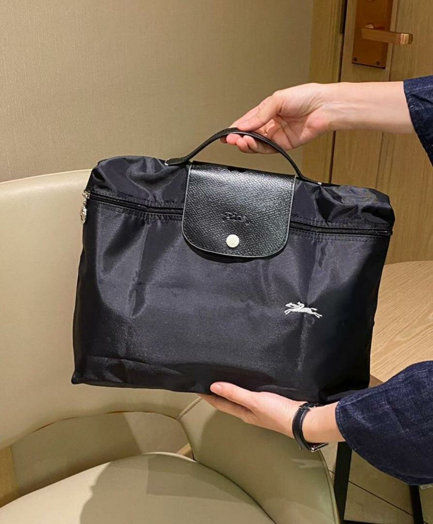 Sac longchamp homme luxe