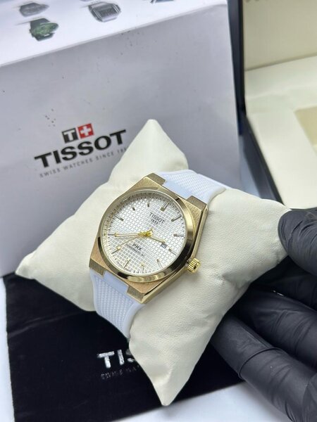 Montre Tissot homme en or rose