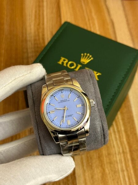 Montre Rolex en acier or