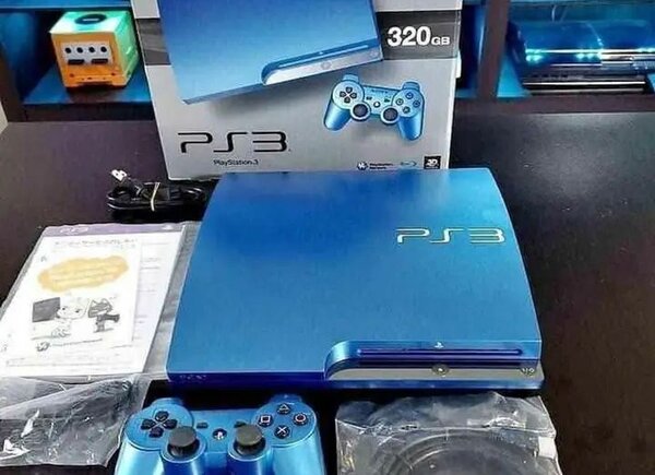 Console Sony PS3 avec manette et accessoires