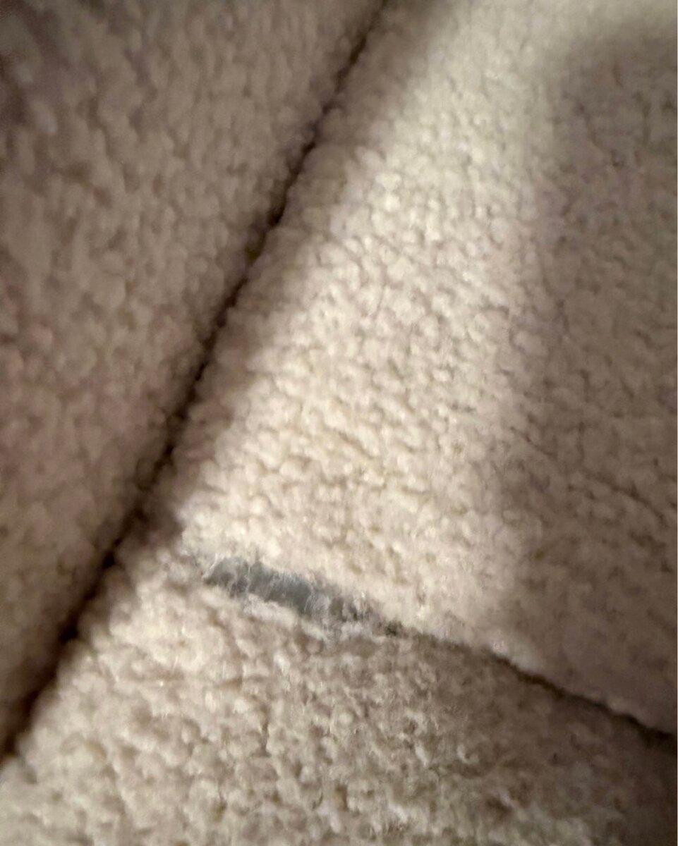 Fauteuil ergonomique en tissu bouclé blanc