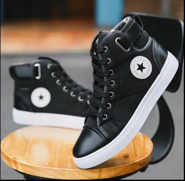 Chaussures montantes Converse en cuir noir