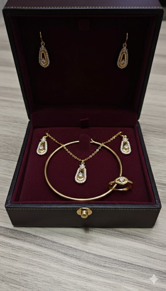 Ensemble bijoux or zirconia goutte