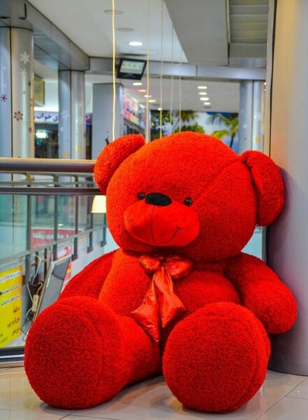 Gros ours en peluche rouge