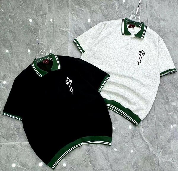 Polo homme noir et blanc avec détails verts