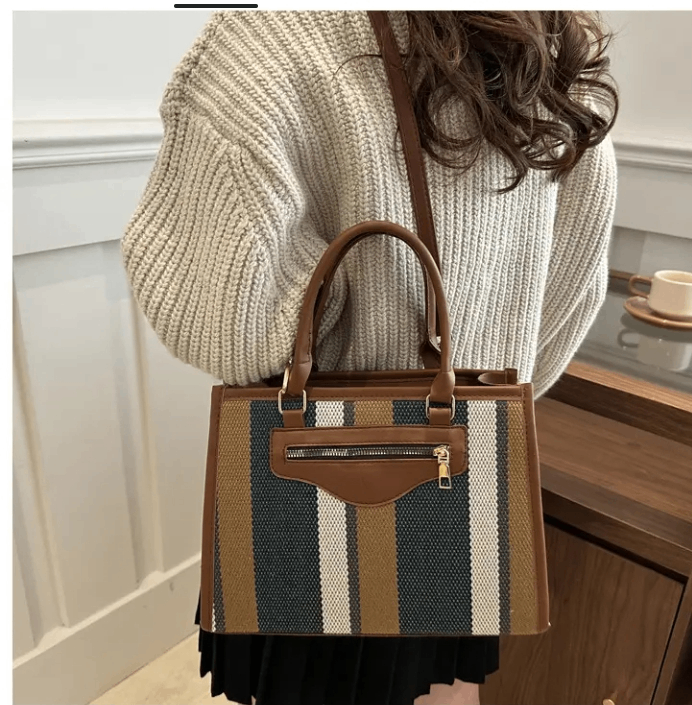 Sac à main en cuir rayé élégan