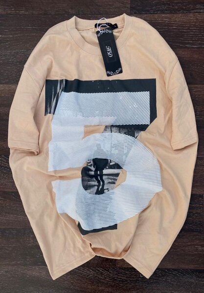 T-shirt oversize beige graphique