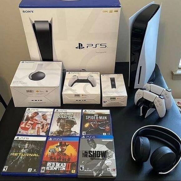 Console Sony PS5 avec accessoires et jeux vidéo