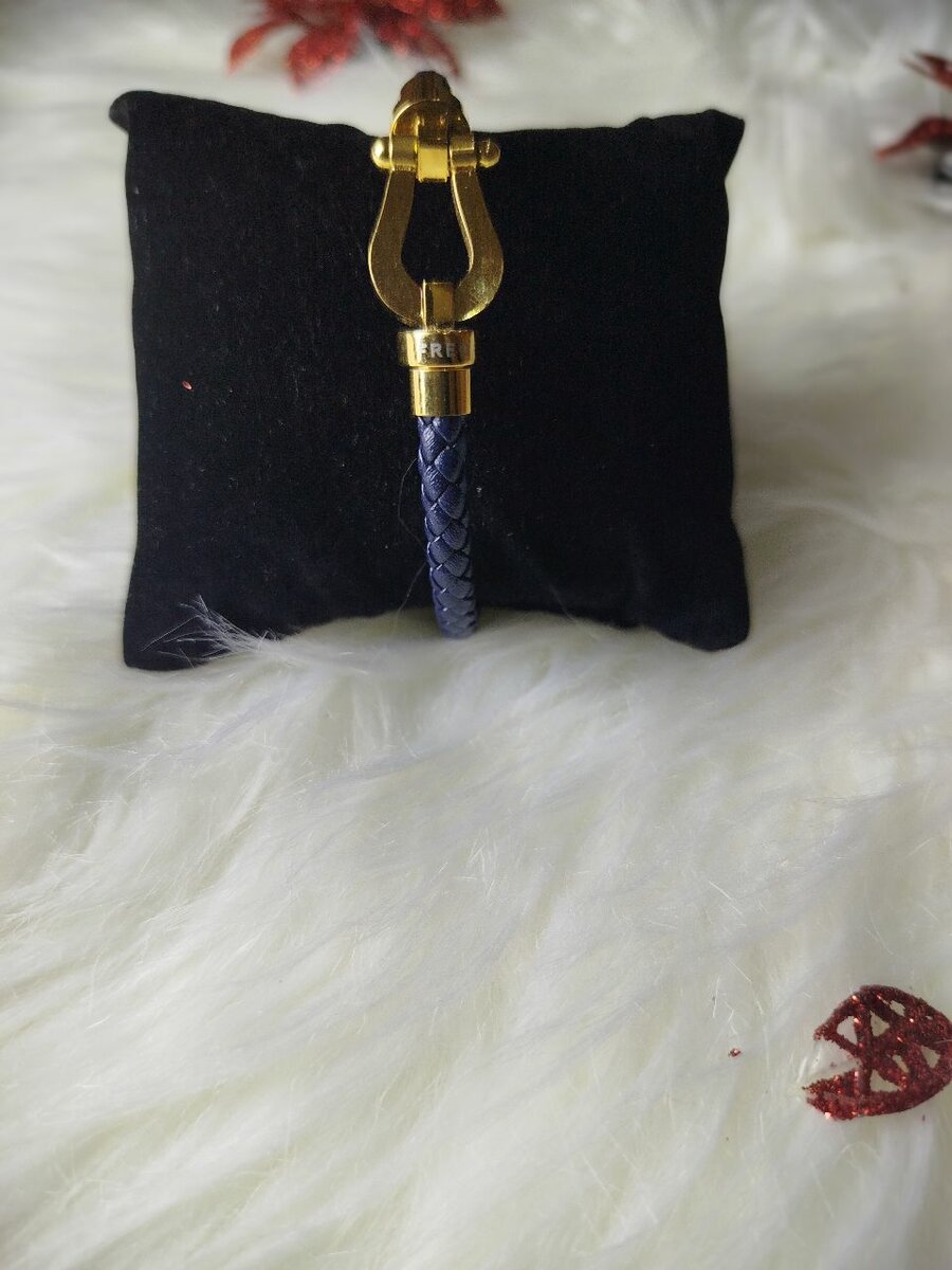 Bracelet en cuir tressé doré