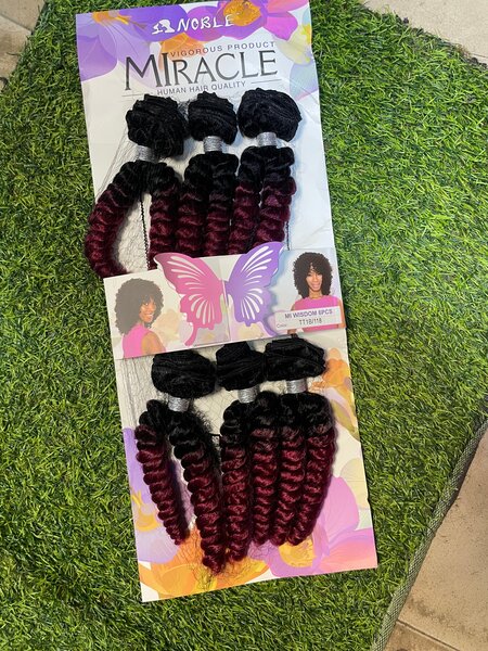 Extensions cheveux bouclés