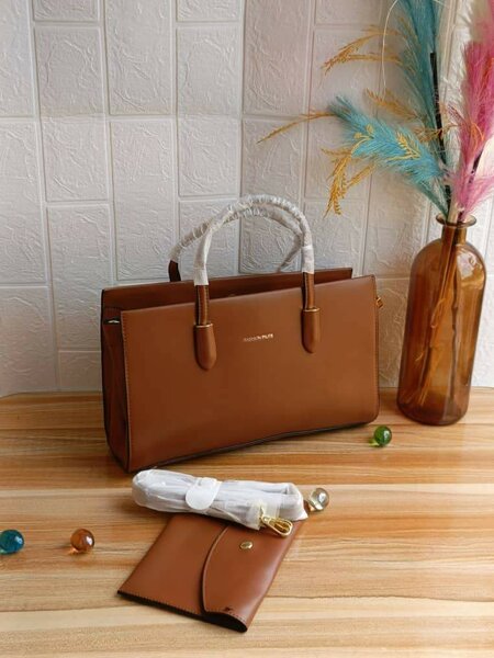 Sac en cuir tissé élégant