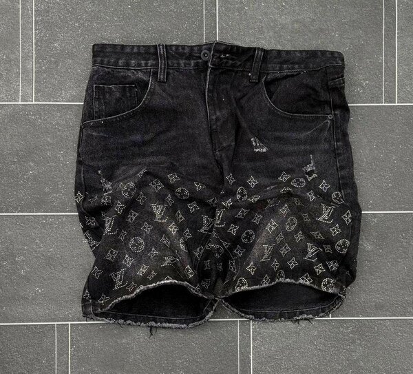 Shorts en denim noir déchiré