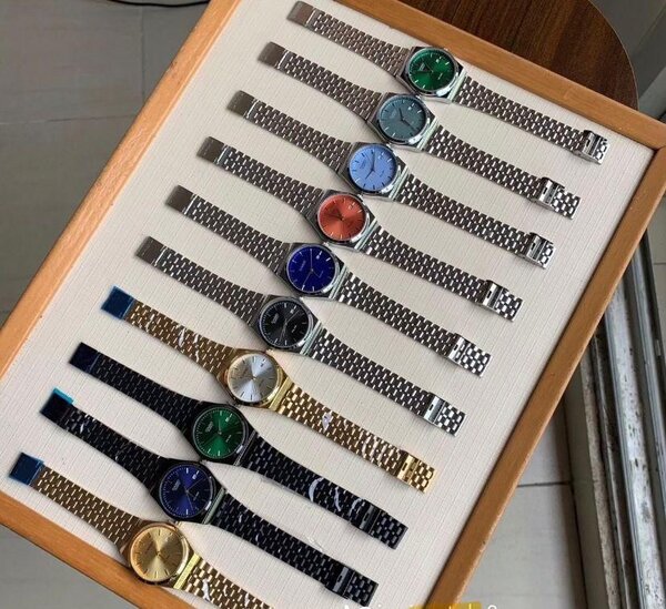 Montre métallique pour homme et femme