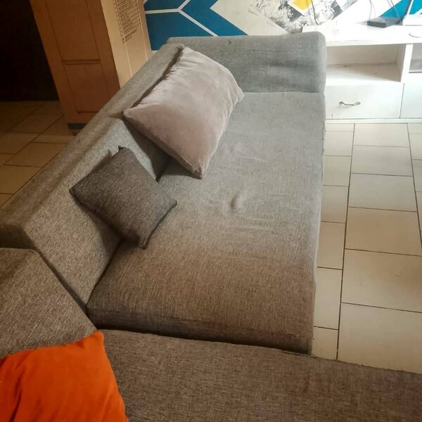 Canapé d'angle gris en tissu