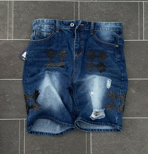 Shorts en jeans déchirés pour homme