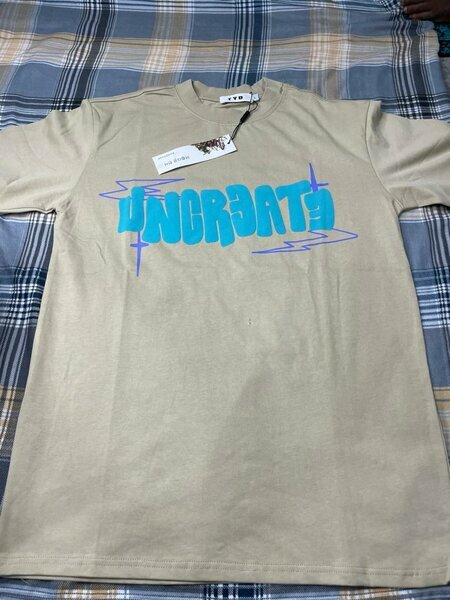 T-shirt beige "Uncreate" logo
