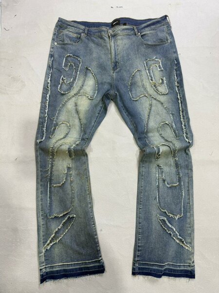 Jeans déchirés homme