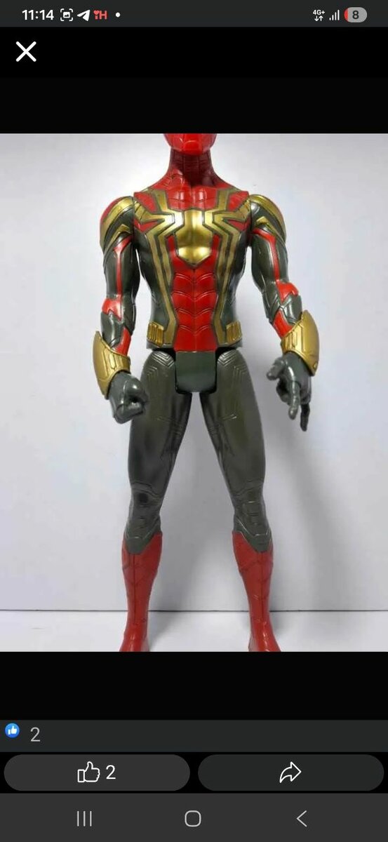 Figurine de super-héros en costume rouge et doré