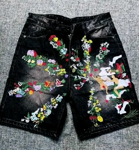 Shorts en jeans noir avec motifs brodés