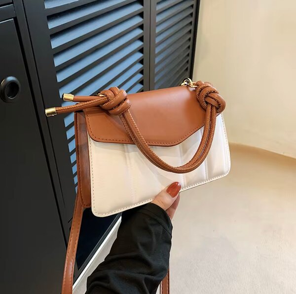 Sac à main élégant bicolore