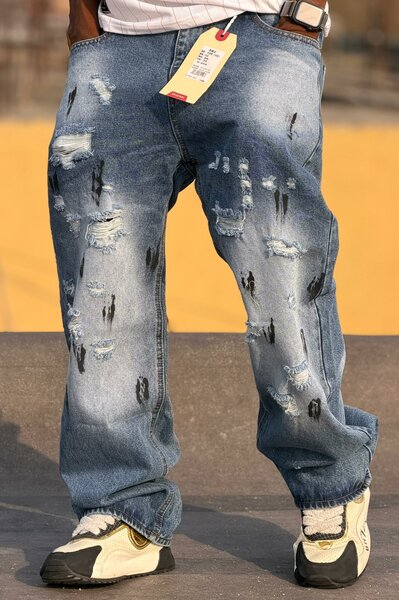 Jeans déchirés homme