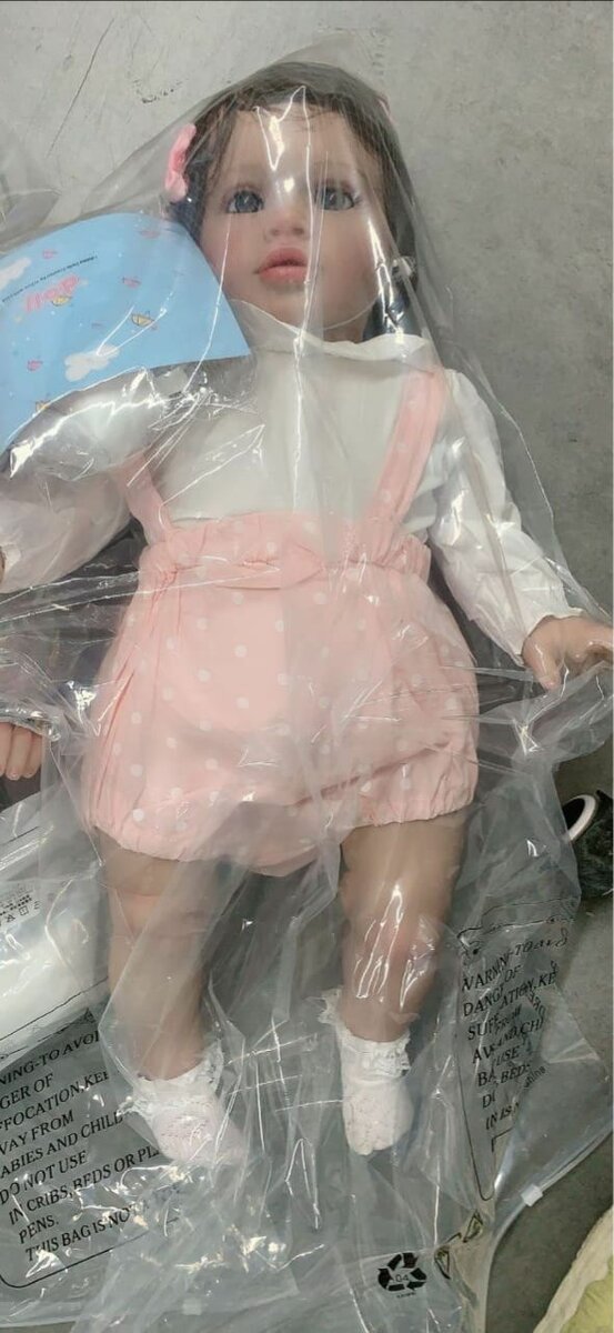 Poupée réaliste en vinyle 75cm