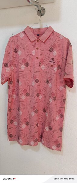 Polo homme rose motif tropical