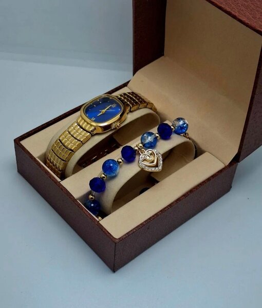 Montre et bracelet en or avec perles bleues