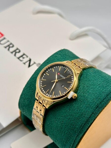 Montre dorée élégante Curren