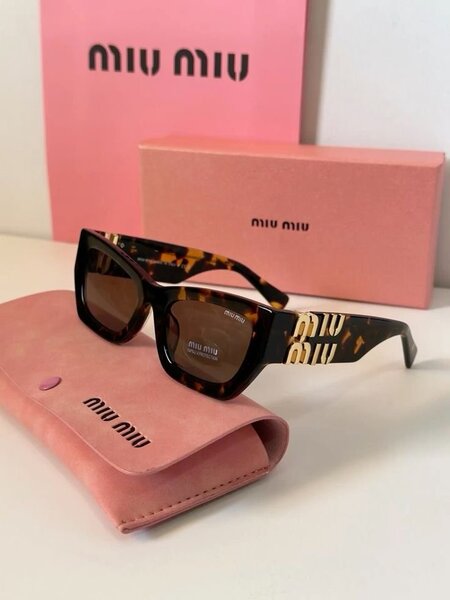 Miu Miu Tortoise Sunglasses