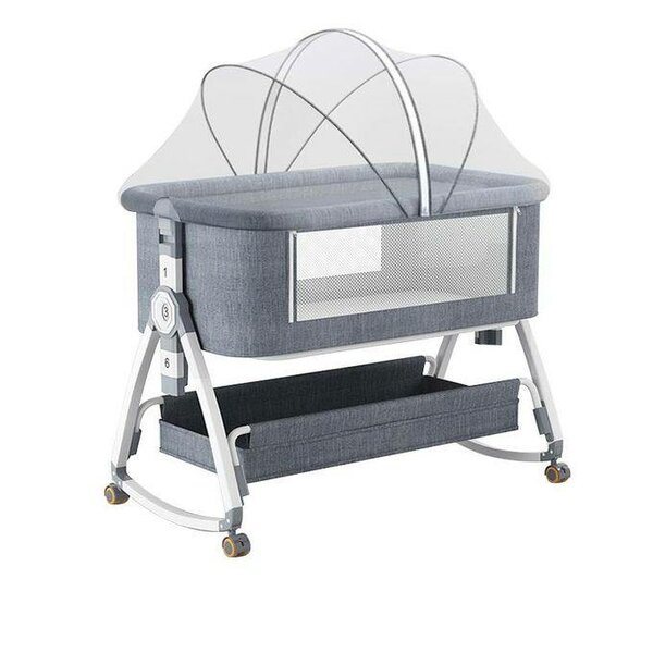 Lit bébé confortable avec moustiquaire